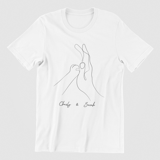 White T-shirt with Human & Cat Paw T-Shirt featuring a custom design of a cat paw and human hand holding each other, symbolizing the bond between pet and owner.