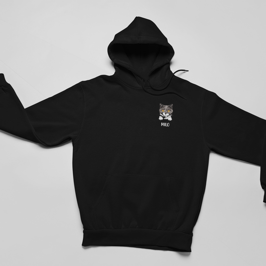 Image of a hoodie featuring a peeking cat head design with a personalized name below