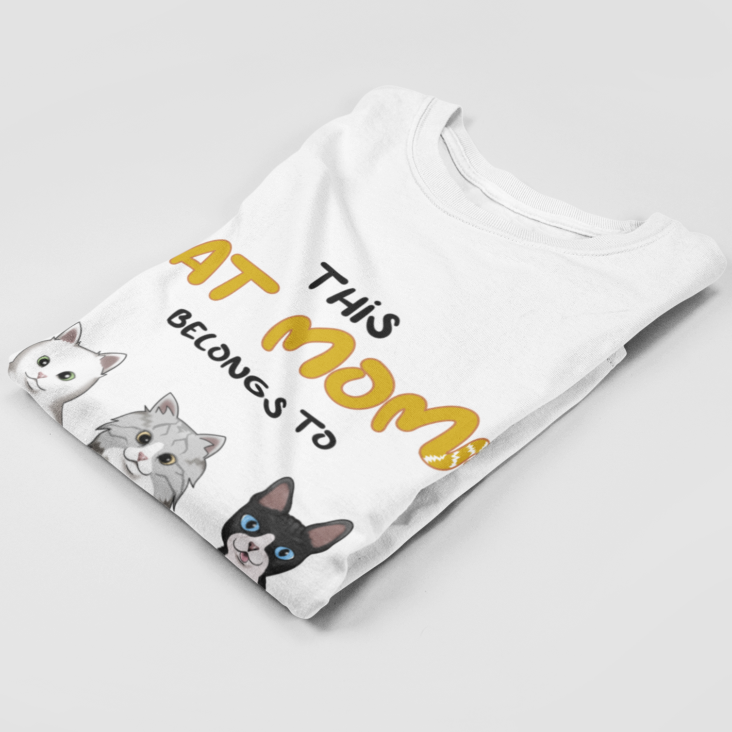 Folded Personalized Katzenmama T-Shirt showcasing unique cat motif print.