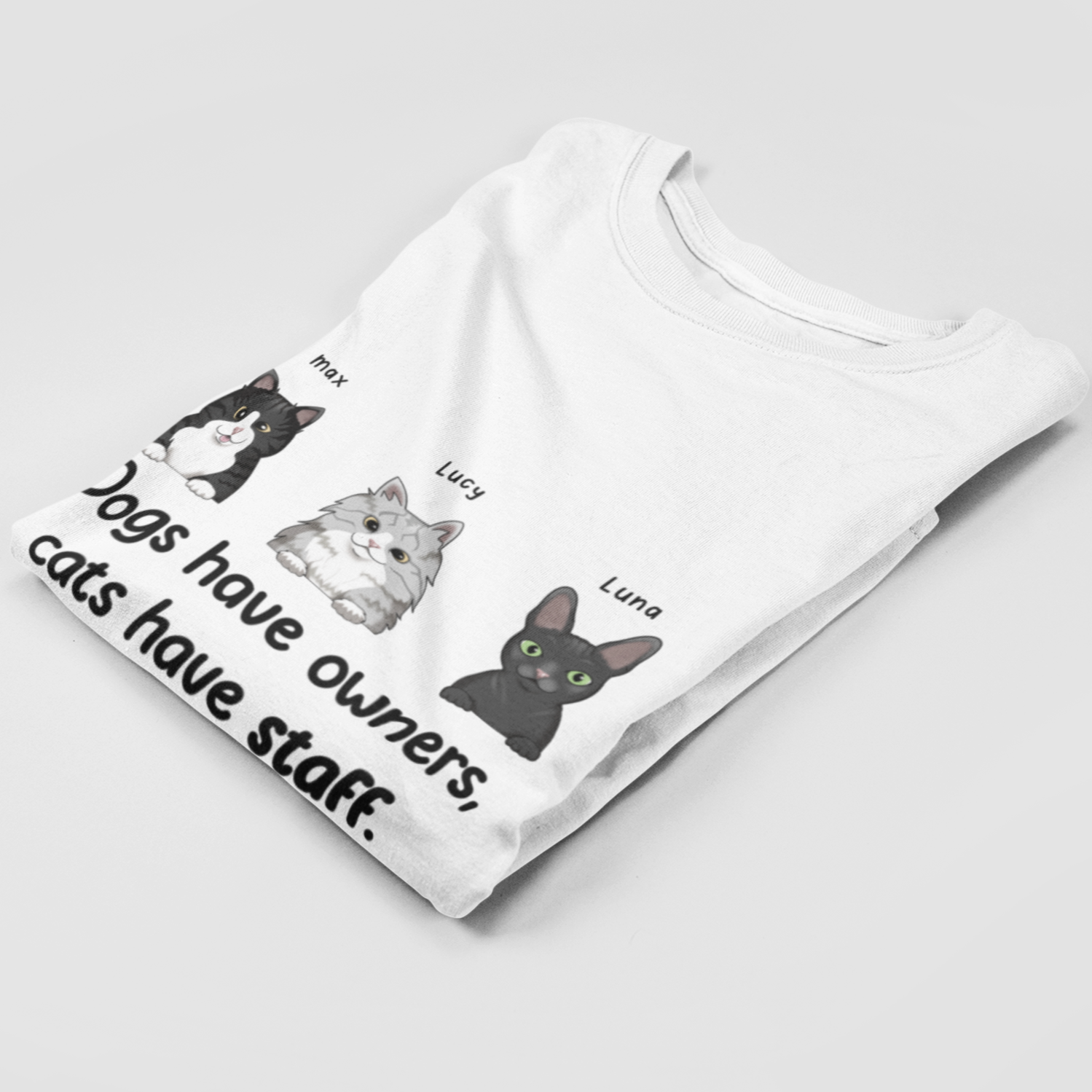 Folded Personalized Cats have staff T-Shirt showcasing unique cat motif print.
