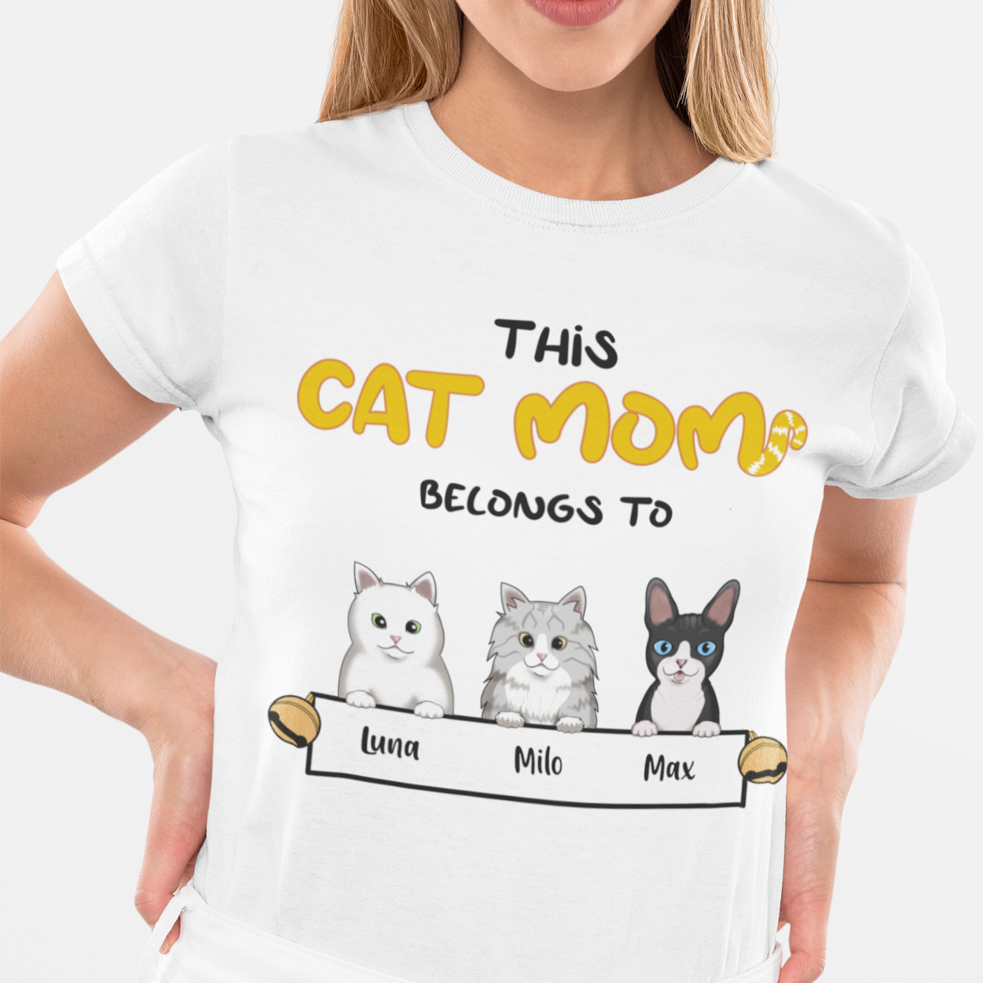 Woman wearing a Personalized Cat Mom T-Shirt with unique cat motif print.
